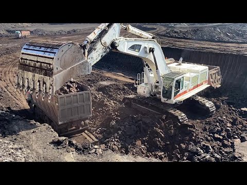 Caterpillar 385C Excavator In White Colors Loading Coal On Trucks - Interkat SA