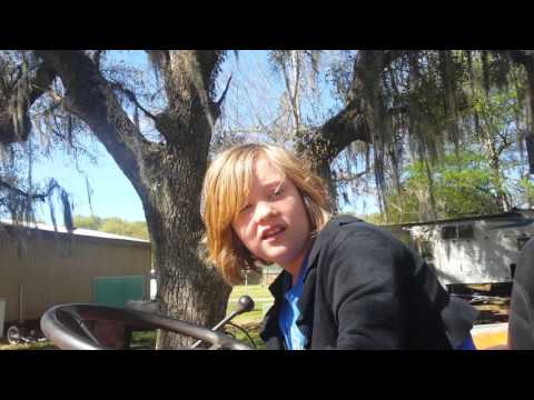 Ellie's first time working the tractor