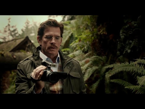 Lucky Them trailer frame with Toni Collette walking through a dim Seattle club