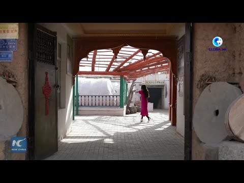 I am in Xinjiang | Uyghur musical instrument making thrives in inheritance