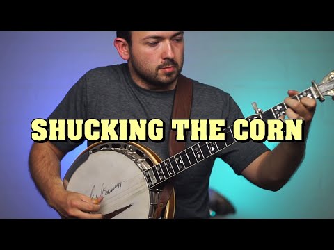 Shucking The Corn - John Moore