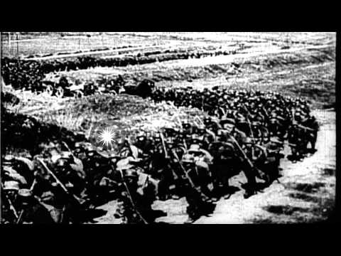 General Pershing reviews troops as they fire artillery and advance during a night...HD Stock Footage