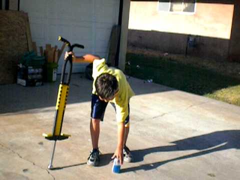 stupid kid tryin to crush a can w/ poggo stick