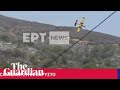 Moment firefighting plane crashes on Greek island of Evia