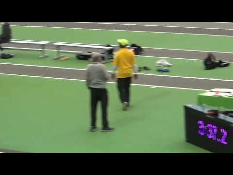 Allison and Ava in the mile @ Bishop Loughlin Games 12/19/2021