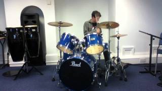 Graeme Miller playing drums.