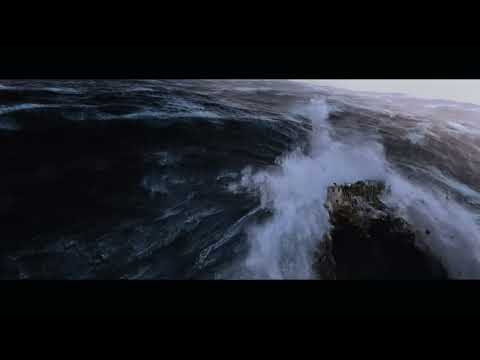2012 trailer frame: ark doors closing as waves crest, echoing the choir-heavy climax