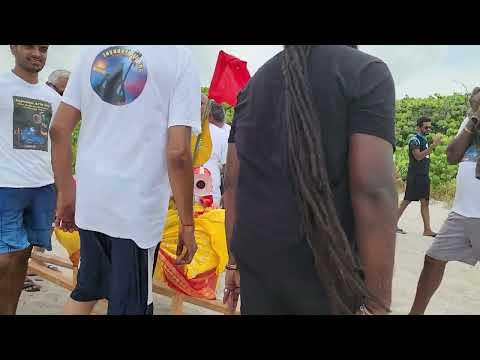 releasing lingam at the beach after Yagna 2023