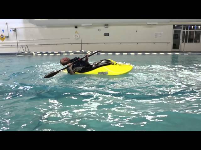 learn how to back deck roll a kayak