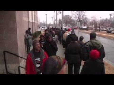 Protesters called for two Detroit-area police officers to be fired after video surfaced that showed