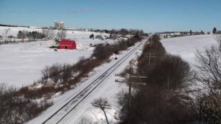 preview picture of video 'CN train #120 approaching Milford NS in the snow, 31 January 2011.'