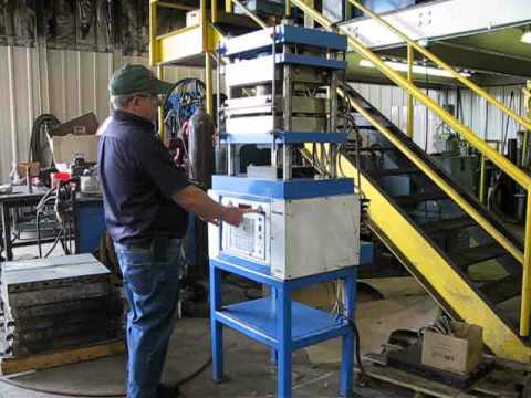 24 Ton Tetrahedron MTP-14 Air Over Oil Press.  Icon Industries, Inc.