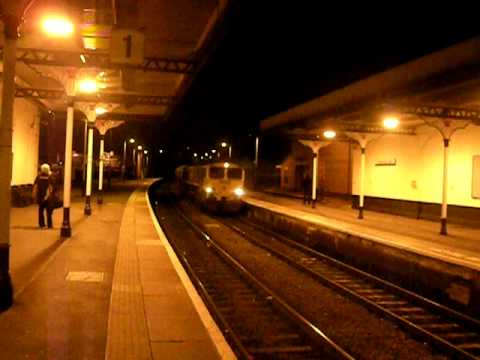 Freightliner class 66 opens the throttle through Cheltenham Spa