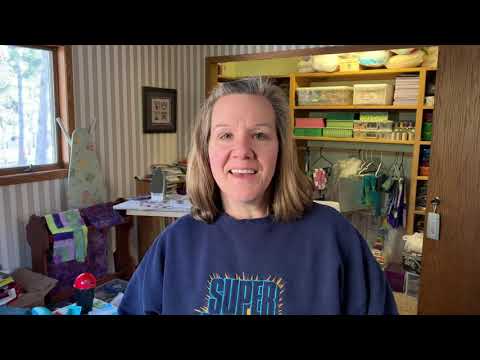 Quickly cut a layer cake into charm squares using the Stripology Squared ruler.