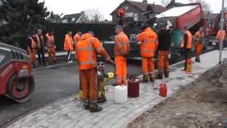 preview picture of video 'Herinrichting Oosterweg Wijchen dl 21 / asfalteren (3) de fietsstraat'