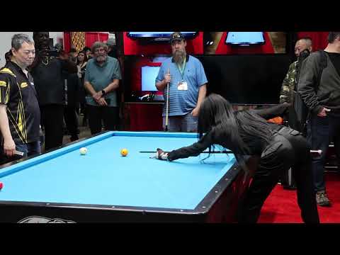 Jeanette Lee "The Black Widow" plays 3-cushion carom billiards.