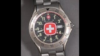 Wenger S.A.K design 1990s field watch 24hr bezel 096.0636 Swiss ETA 805.121 battery service & review