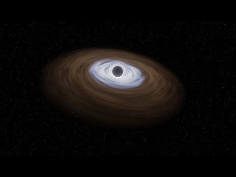 The Spooky Possibility that the Universe is a Rotating Black Hole