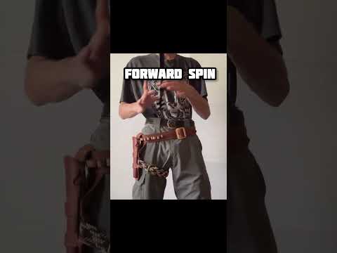 Single action revolver gun spinning tricks. Switching hands.