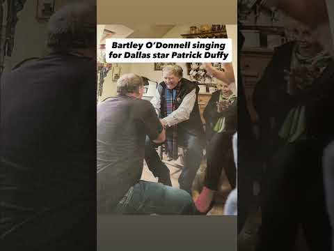 Iconic photo of Bartley O’Donnell singing for Dallas star Patrick Duffy