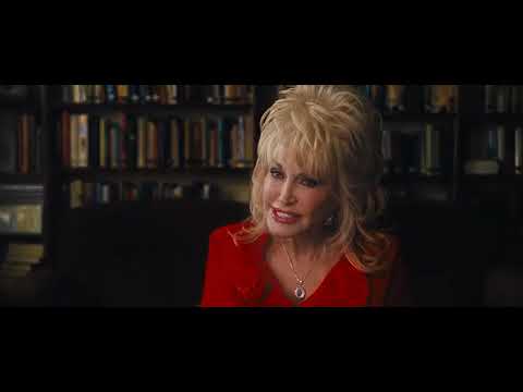 Official Joyful Noise trailer still: choir in gold robes with Queen Latifah and Dolly Parton upfront