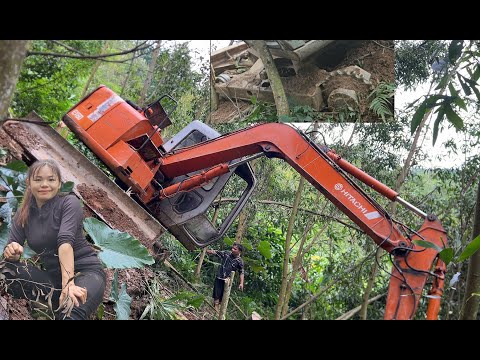 Excavator falls down hillside while clearing road - dramatic rescue