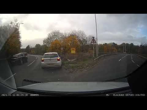 Car Missed Its Exit off the Roundabout Then Decided to Change Lane and Caused a Crash