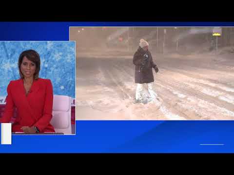 Snow piles up on roads across NYC, travel ban in effect