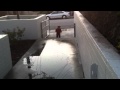 Boy Splashing In Puddles