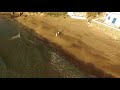 Bride And Groom Walking At The Beach