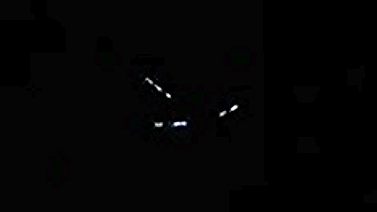Strange UFO hovering in rain over St  Louis, Missouri.