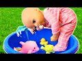 Baby Annabell Doll Plays With Water Toys In A Colorful Container Baby Dolls Videos For Kids
