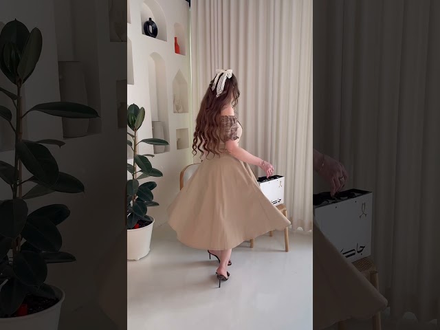 فستان ميدي بيج وأكمام كاروهات