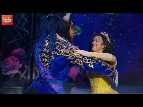 Close-up trailer still of Lumière leading a choreographic flourish with chorus line