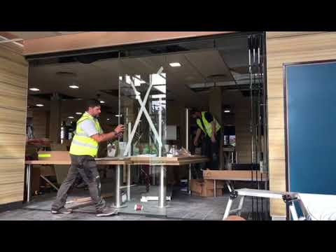 Click to play video of frameless doors
