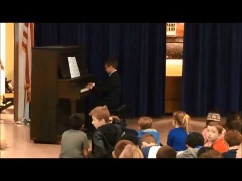 Maxwell plays the theme from The Odd Couple at his school talent shows