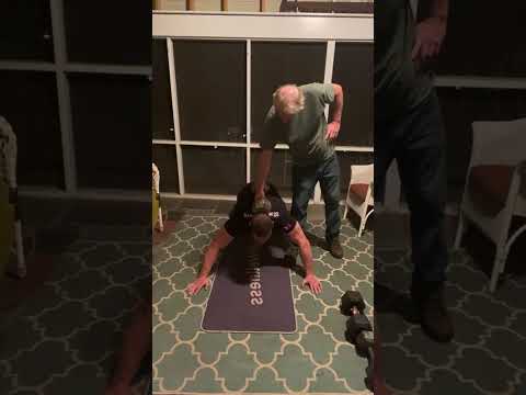 Weighted push-ups with Pops