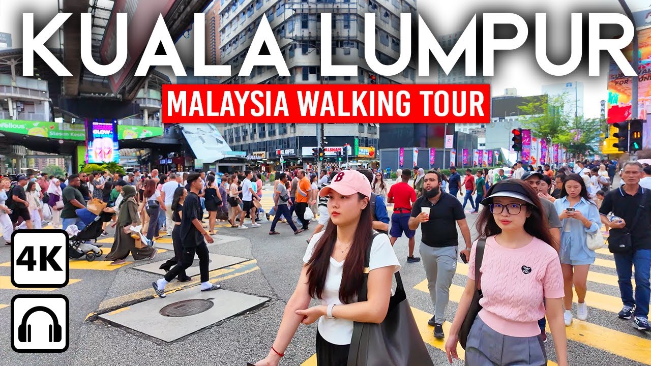 Immersive street-level walking tour through Kuala Lumpur Petronas, Malaysia, showcasing authentic urban landscapes, local architecture, and the vibrant atmosphere of the city's neighborhoods