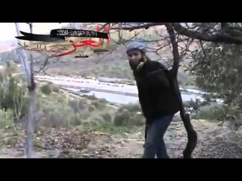 رصد عربة بي ام بي مدمرة بعد استهدافها من قبل كتيبة العز بن عبد السلام أثناء مجريات معركة السيطرة على الشغر في ريف جسر الشغور