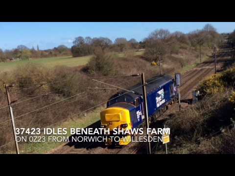 DRS 37423 idles beneath Shaws Farm on 0Z23 from Norwich to Willesden