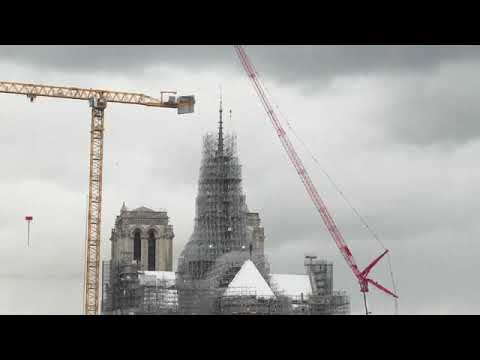Reconstructed Notre Dame Cathedral spire revealed in Paris after devastating 2019 fire