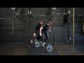 Synchro Lateral Burpees over the Bar