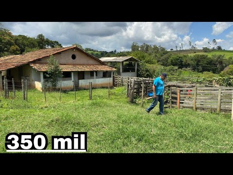 Sítio à venda com muita água e aceita carro no negócio com casa e curral em MG