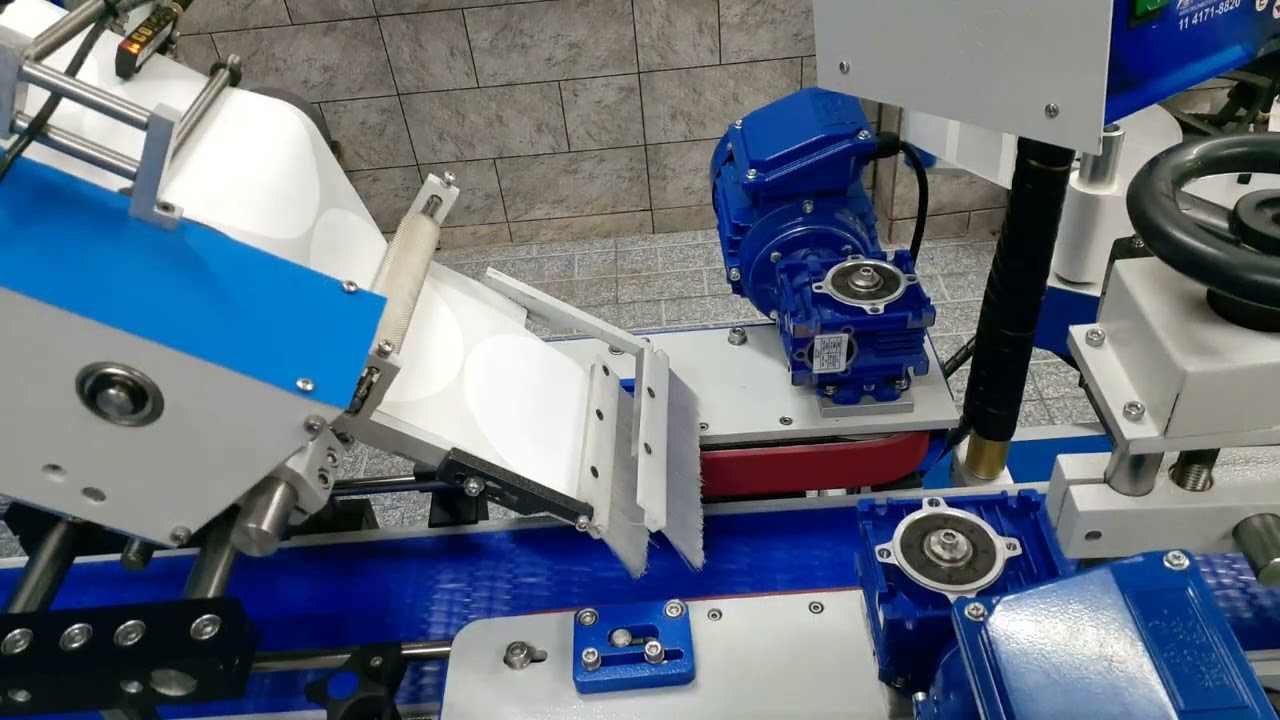 Máquina Rotuladora Superior Automática  - Aplicação em Potes de Sorvete.