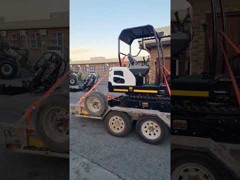 18D Mini Excavator Onto The Road
