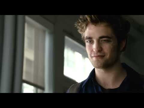 Remember Me 2010 official trailer frame: Robert Pattinson and Emilie de Ravin against New York skyline