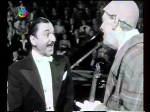 Grock says his famous "Why" ("Warum")