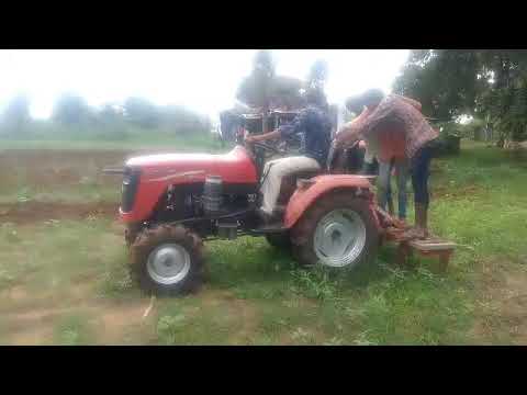 Captain tractor with 7 Tine Cultivator