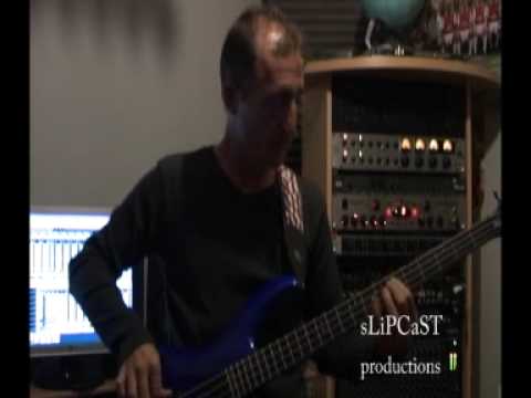 Slipcast, Jonathan Hudson practicing a wee bass line.