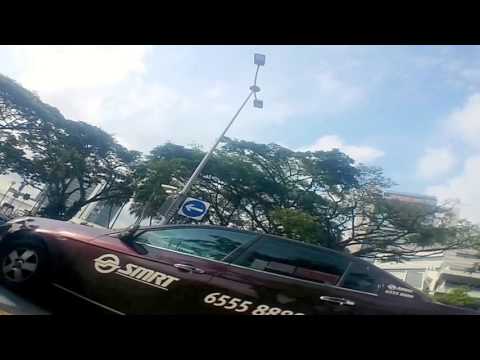 A near hit between a car and a cyclist a Zebra Crossing (not clear)